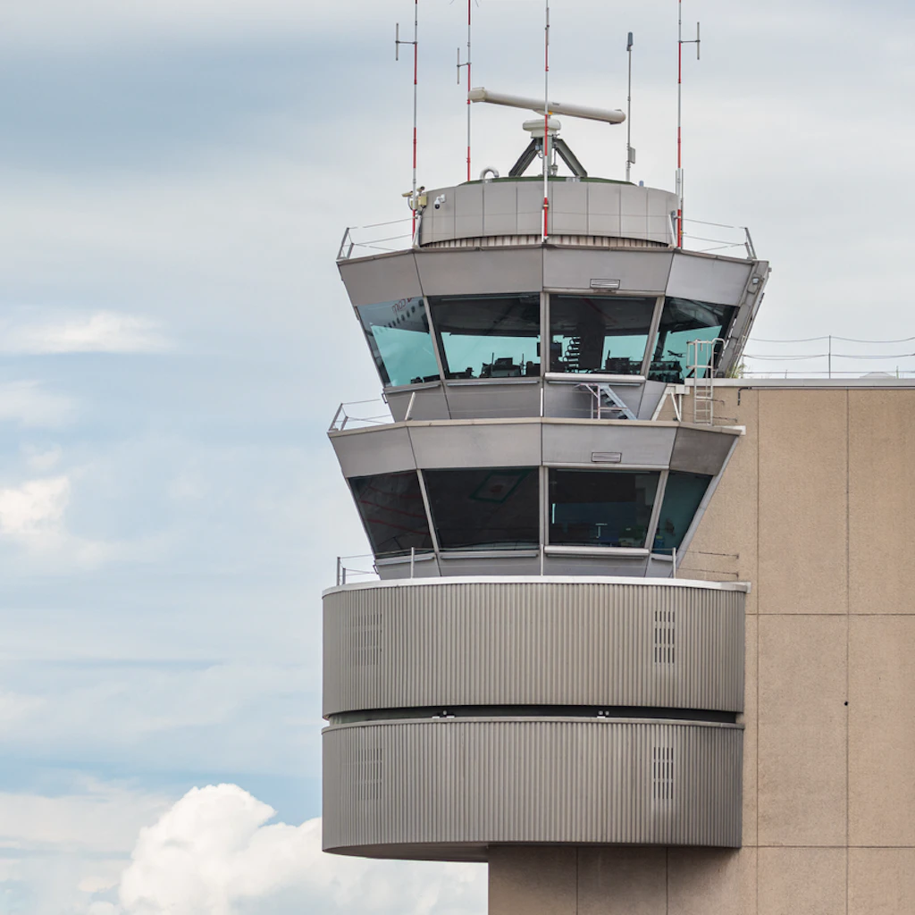 Airplane Taking Off Near LAX Control Tower